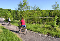 A walking and cycling trail surrounds the lake